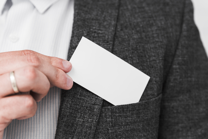 business-people-showing-blank-business-card